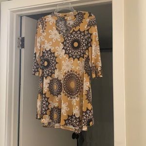 Beautiful soft mustard color dress.